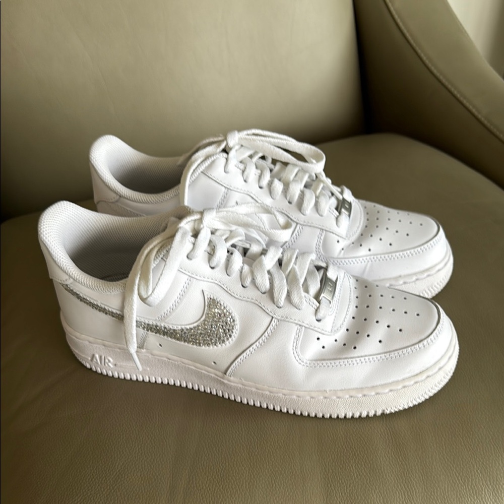 Nike White Sneakers with Silver Detailing